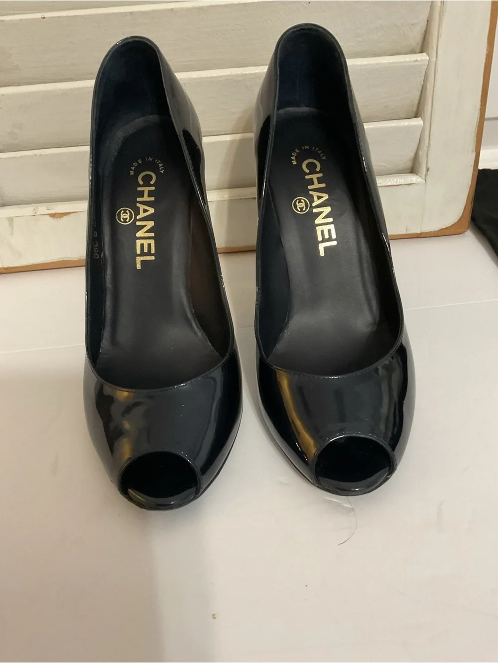 CHANEL glossy patent
